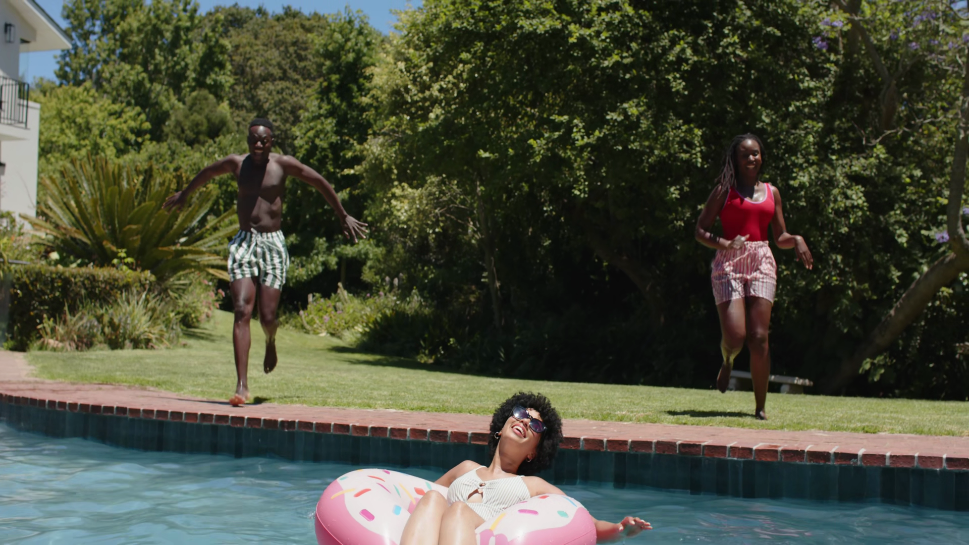Woman On Pink Donut Float Bobbing In Pool Stock Footage SBV-354050967 ...