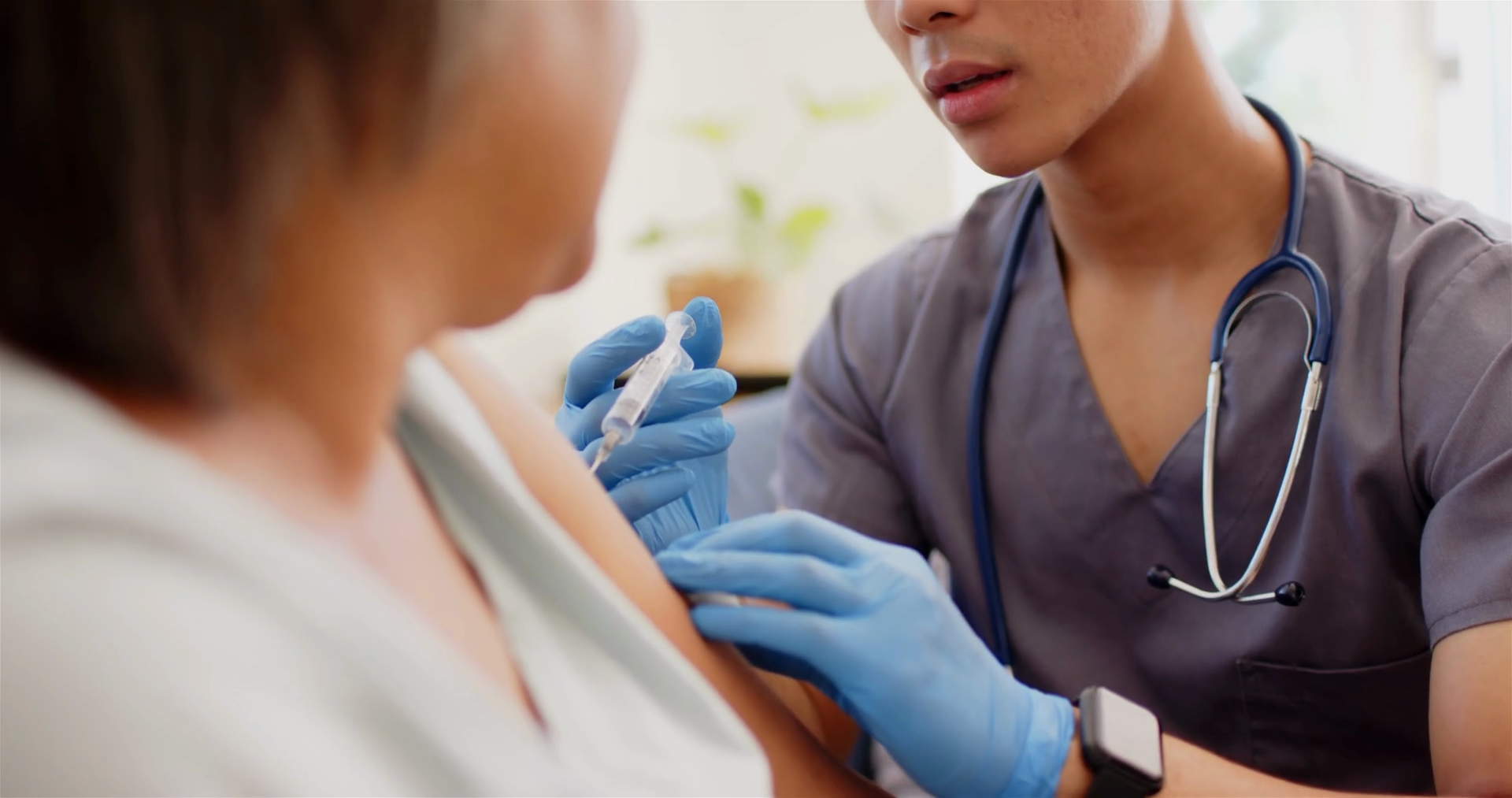 Administering Vaccine Male Nurse With Stock Footage SBV-352121539 ...