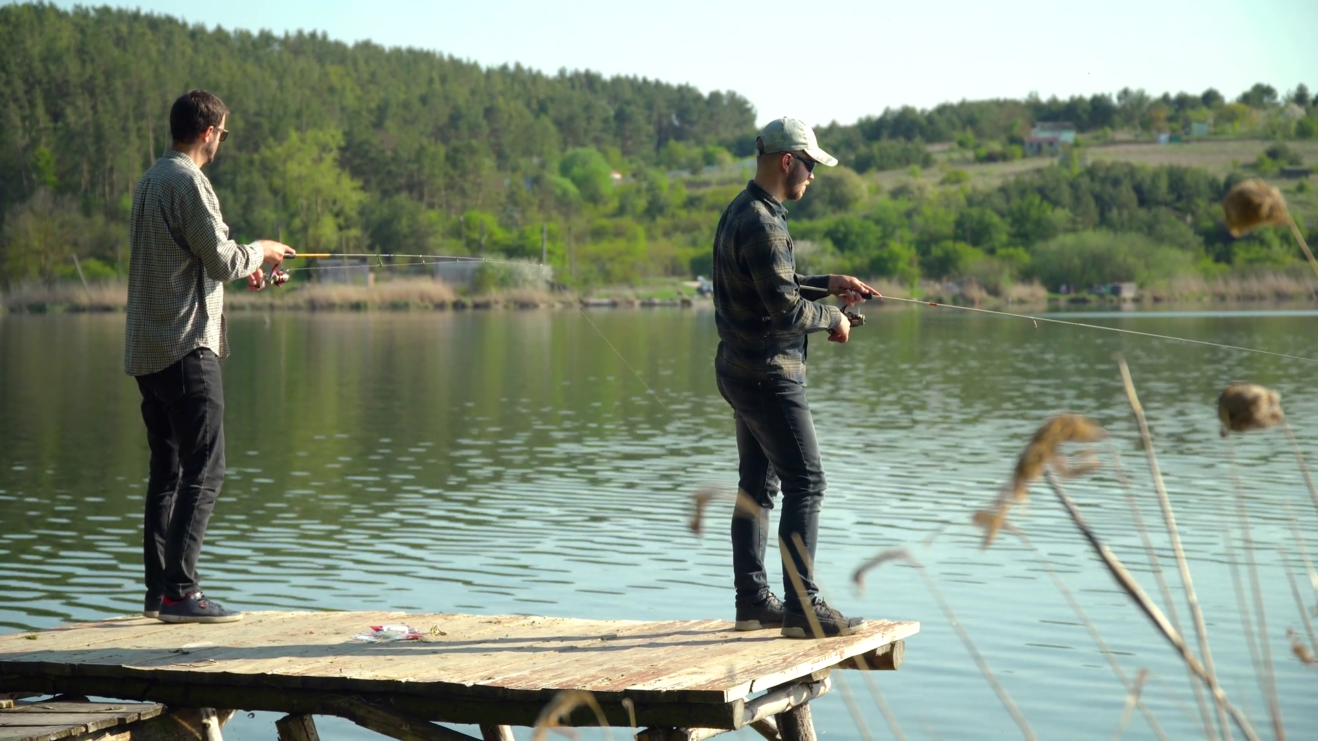 Two Men Are Fishing On Lake Spinning Fishing Stock Footage SBV ...