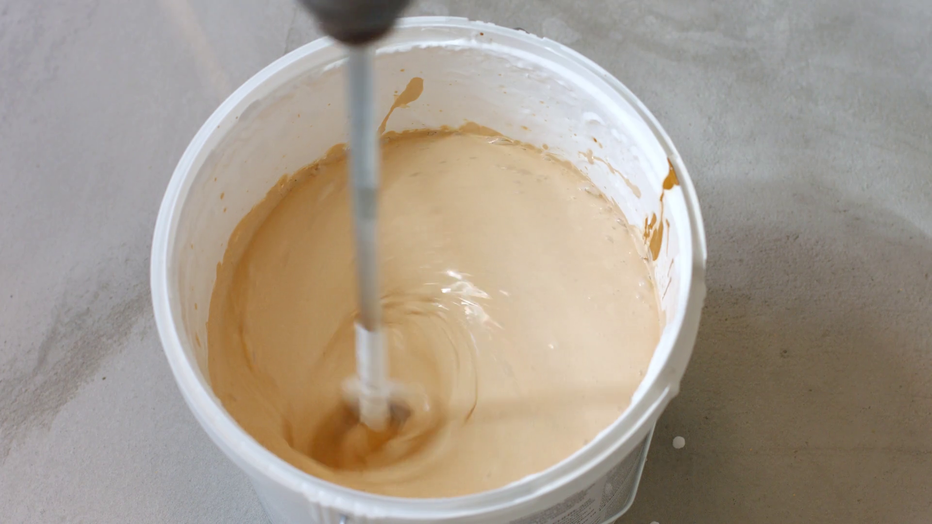 Person Mixes Paint In Bucket Preparation Stock Footage SBV-348983097 ...