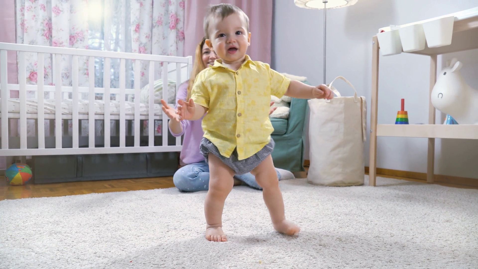 Baby Learning To Walk Taking First Steps At Stock Footage SBV-348433547 ...