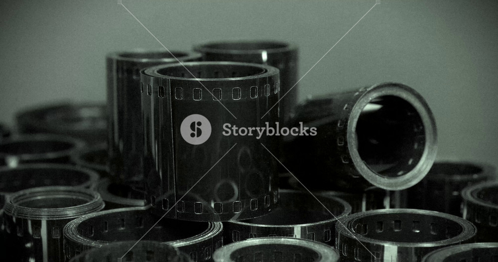 Vintage film rolls for classic photography. Old photographic films. Developed retro film rolls from analog cameras. Old camera film for retro photo shoots