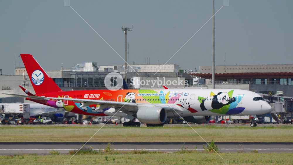 MADRID, SPAIN - JUNE 15, 2026: Sichuan Airlines Airbus A350-900 in colorful Panda Route special livery taxiing for takeoff at Madrid Barajas
