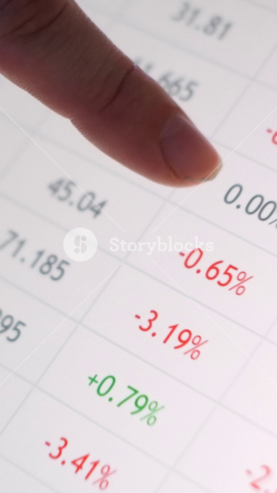Digital financial table with fluctuating market percentages in red and green illustrating investment performance, stock volatility, and