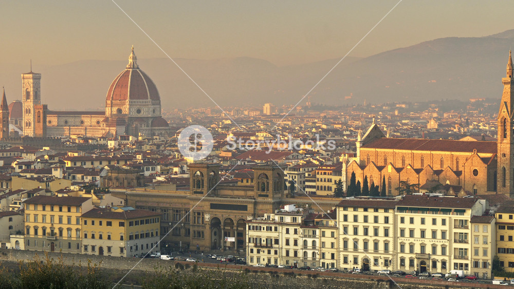 Foggy Florence, Italy. Panning shot of Florence old city center at sunset lights. Shot from Michelangelo square. UHD, 4K