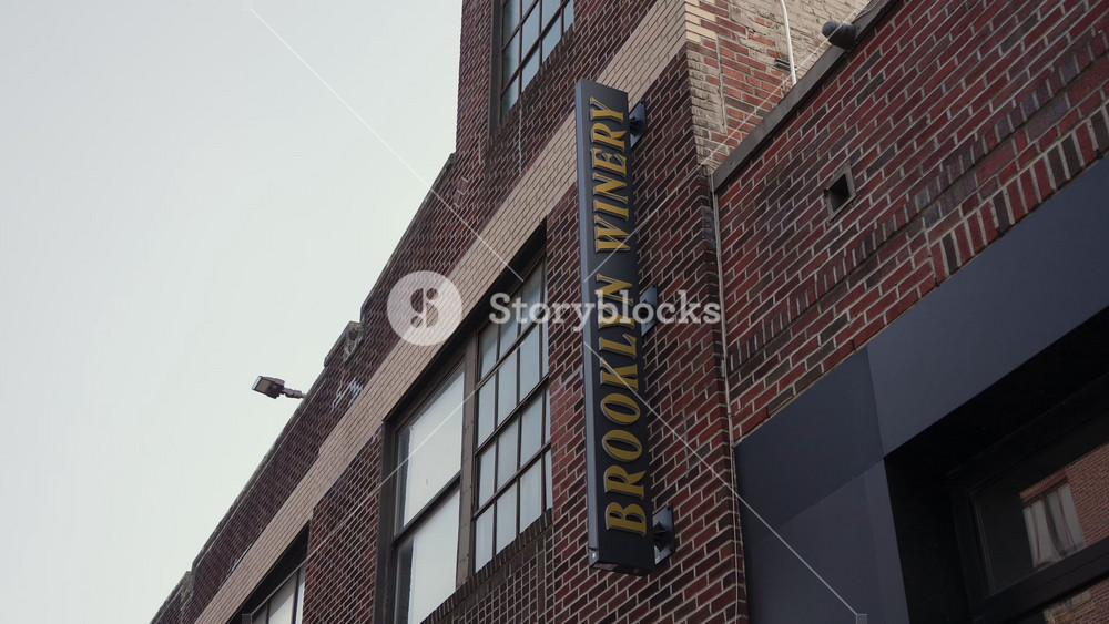 NEW YORK, USA - APRIL 23, 2025: Behold the captivating view of Brooklyn Winery sign, showcasing urban charm in a unique industrial setting