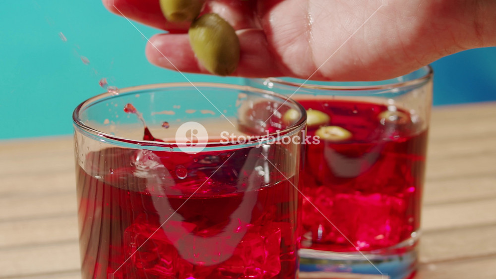 Vermouth Negroni, spanish wine drink, Alcoholic Americano Cocktail bitter, sweet vermouth and soda water, close up of making drink, summer