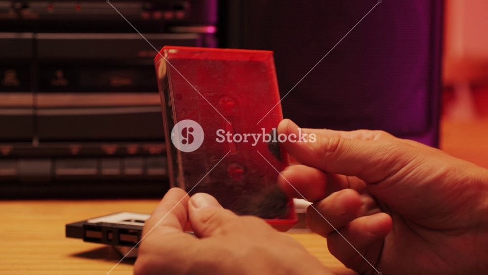 Retro radio tape recorder, audio cassette close-up. Listening to music, old radio boombox player, searching channel.