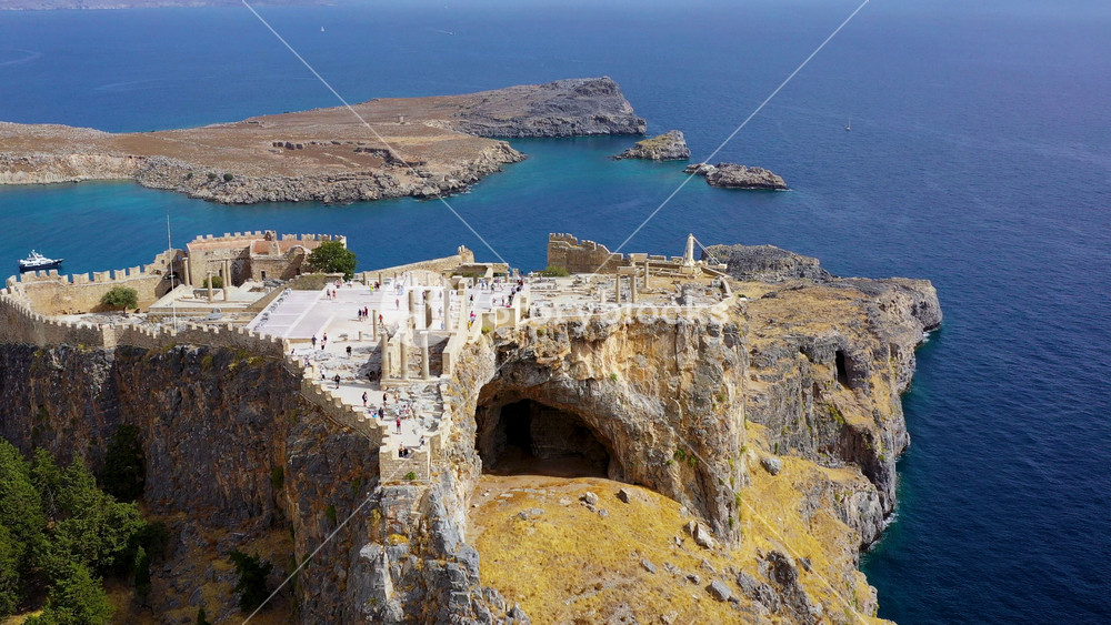 Ruins of Acropolis of Lindos view from above, Rhodes, Dodecanese Islands, Greek Islands, Greece. Acropolis of Lindos, ancient architecture of Rhodes, Greece.