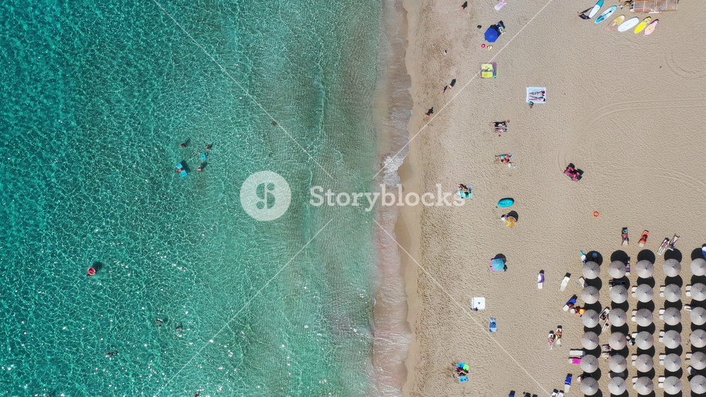 Aerial drone video of Falassarna beach, crystal waters, golden sand, endless sandy turquoise beach of Falassarna in Crete island, Greece. Famous Falasarna (also known as Falassarna or Phalasarna).
