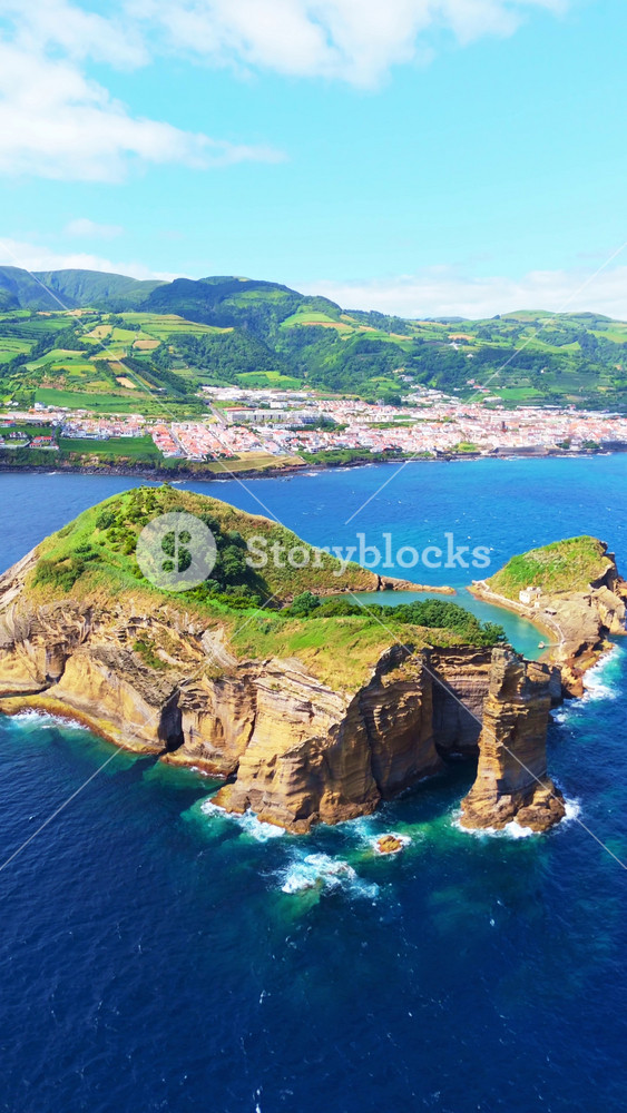 Vila Franca Islet, Vila Franca Do Campo Town and Atlantic Ocean on Sunny Day. Azores, Sao Miguel Island. Portugal. Aerial View. Orbiting. Vertical Video