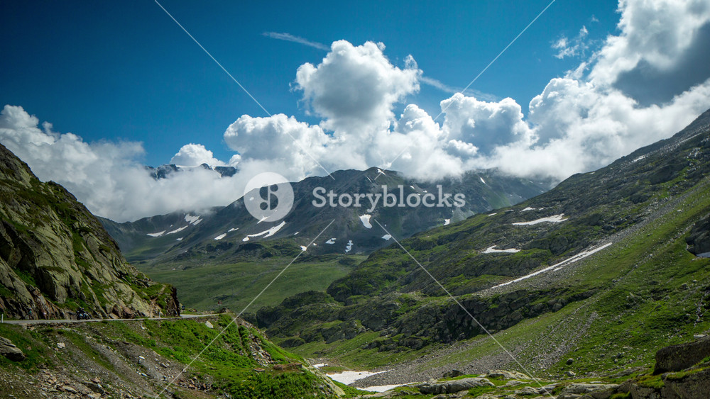 pretty timelapse of the Great St Bernard Pass and surrounding mountains in the Alps where Italy and Switzerland meet. this high road pass at 2469m is only open in the summer months.