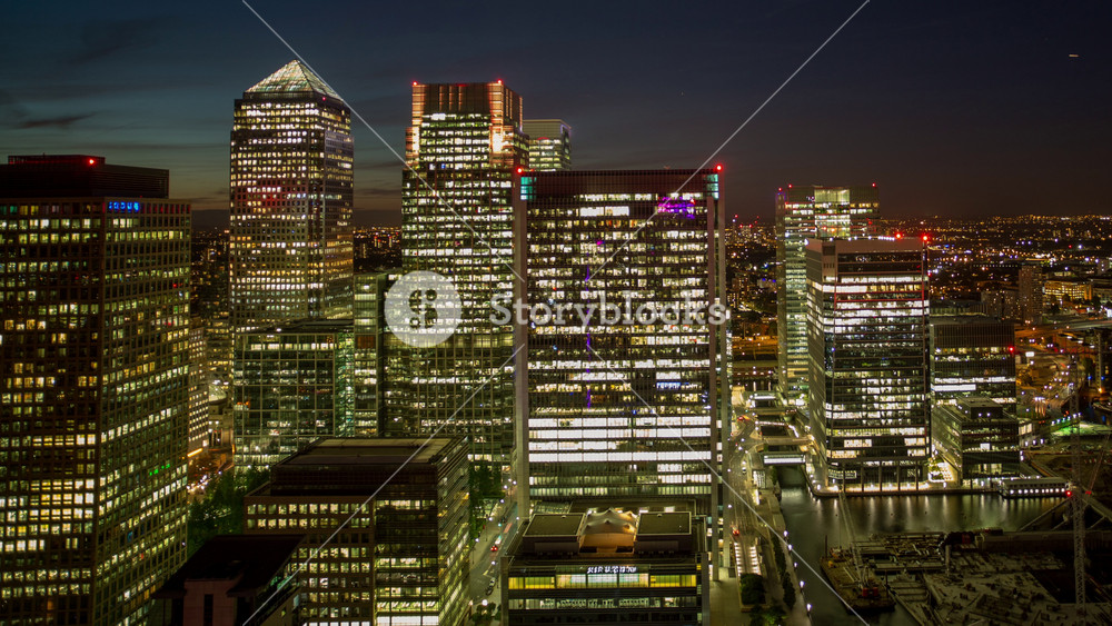 sunset timelapse of the financial skyscrapers of london docklands, canary wharf shot from a unique vantage point