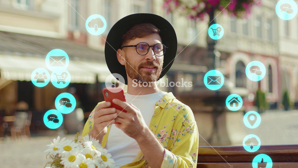 Close up young man wear hat and glasses with flowers use phone sitting smiling waiting for boyfriends. Around social media icons animation