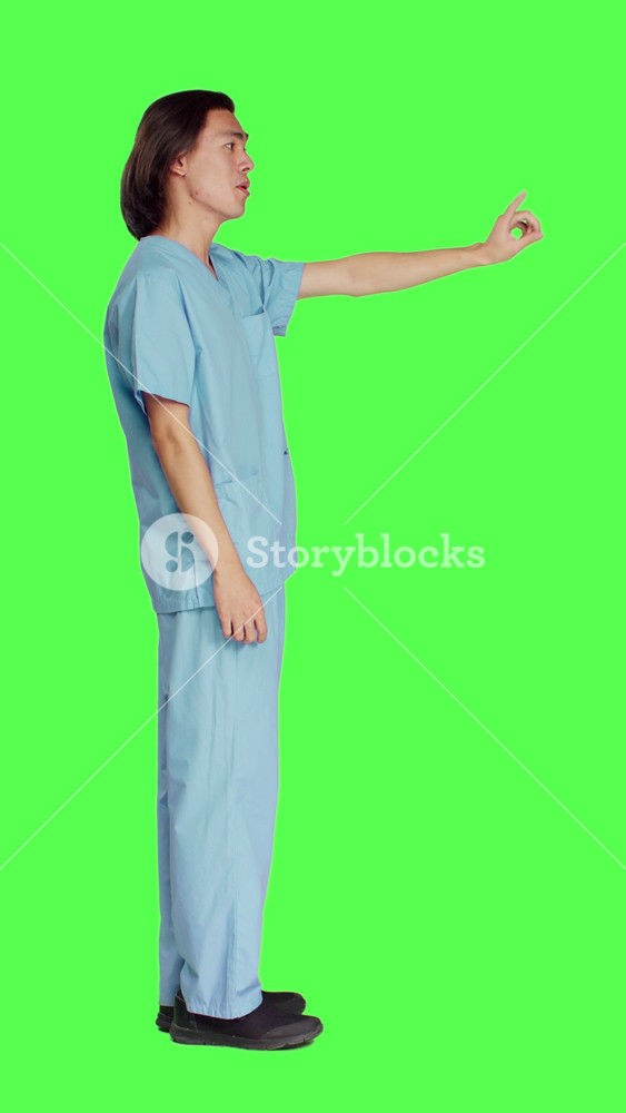 Profile of medical specialist doing no sign on camera, presenting negative reaction and his disapproval. Asian healthcare nurse being
