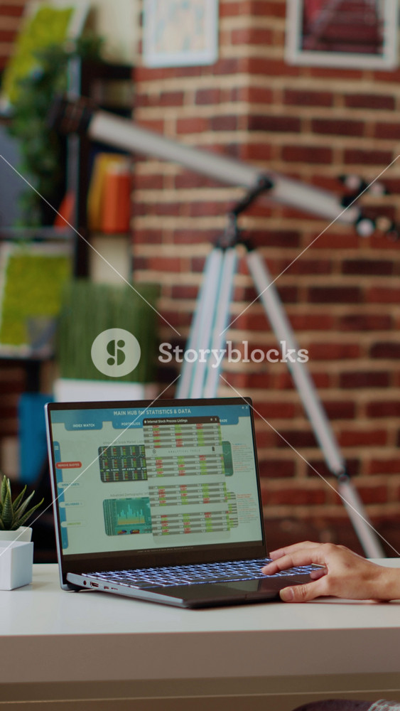 Vertical video Remote stockholder analyzing investment financial profit by looking at market shares graphs. Professional broker investor