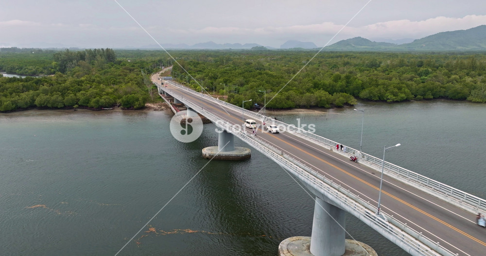Siri Lanta Bridge spanning across the water connects Koh Lanta Island to Krabi Province mainland, surrounded by lush green tropical mangrove