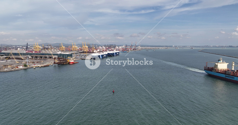 Amphoe Sri Racha, Changwat Chonburi, Thailand, June 27nd, 2024. aerial view onMaersk container ship leaving the deep sea port of Laem