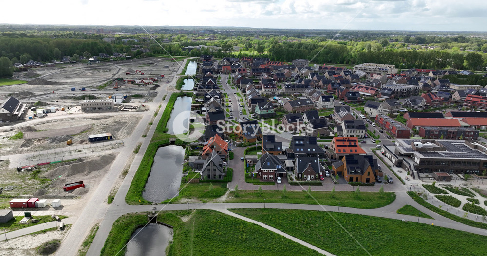 modern suburb, housing, households, new build residential area, housing district, family homes, real estate, investment. Aerial view. The