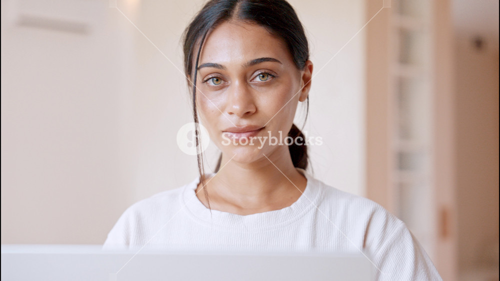 Face of Young Attractive Woman With Green Eyes Looking at Camera. Adult Serious Ethnic Female Professional Posing Home Office. Alone Girl in