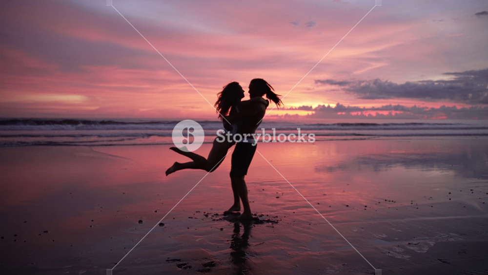 Couple Of People In Love At Sea Beach Sunset And Ocean Water. Modern Caucasian Family Of Two Lovers Embracing In Dance Or Hugging. Beauty
