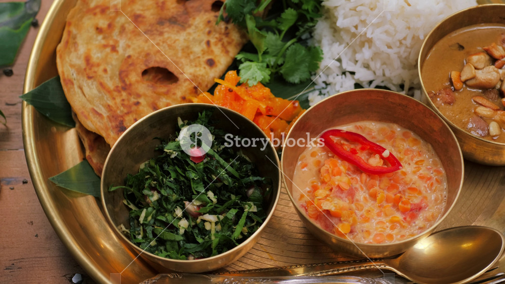 indian sri-lanka food set on wooden background. Dishes and appetisers of indeed cuisine, rice, lentils, paneer, samosa, spices, masala