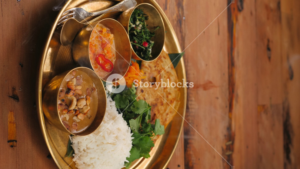 indian sri-lanka food set on wooden background. Dishes and appetisers of indeed cuisine, rice, lentils, paneer, samosa, spices, masala