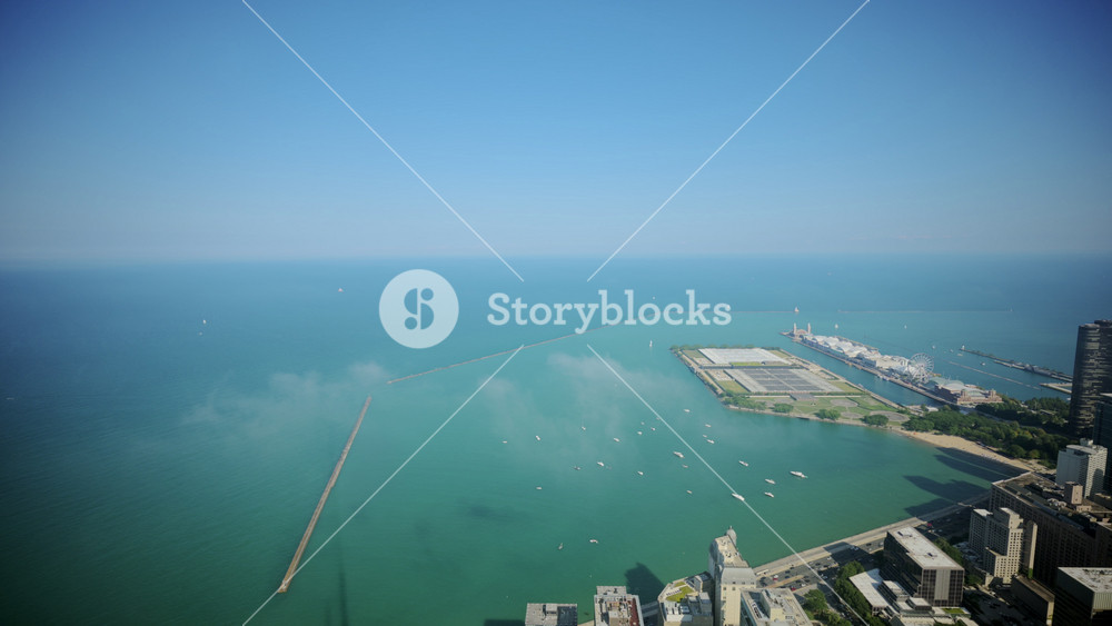 Aerial view of the Navy pier in Chicago Harbor with downtown City skyline background. Sunny day in Chicago IL. USA 28 aug 2024