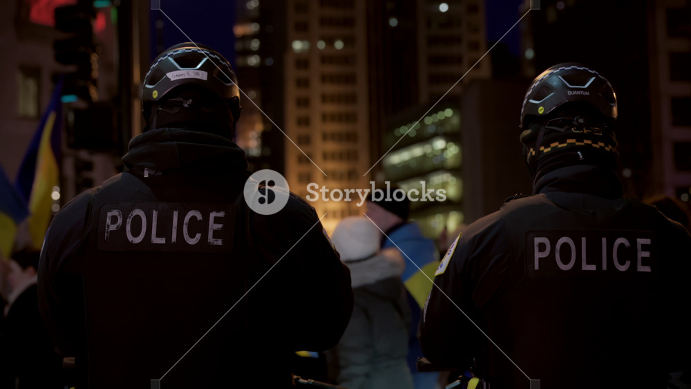 Policemen of Chicago police department watching over the Ukrainian demonstration against russian invasion. Chicago, USA 24 Feb 2025