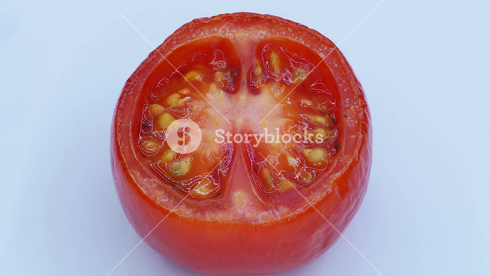 8K Timelapse shows tomato slice rotting with mold growth, food spoilage and decay. Fast lapse reveals fungus spreading on expired produce, signaling waste, contamination, unhealthy risk. Rotten.