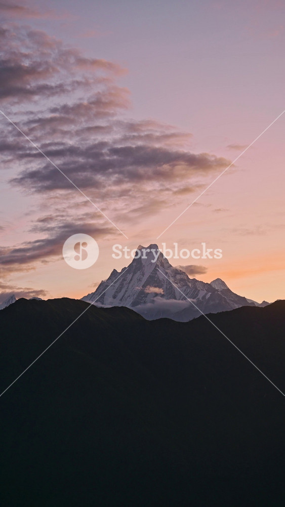 Himalayas Mountains at Sunrise in Nepal, Vertical Video for Social Media Instagram Reels and Tiktok of Dramatic Orange Sunrise Sky and