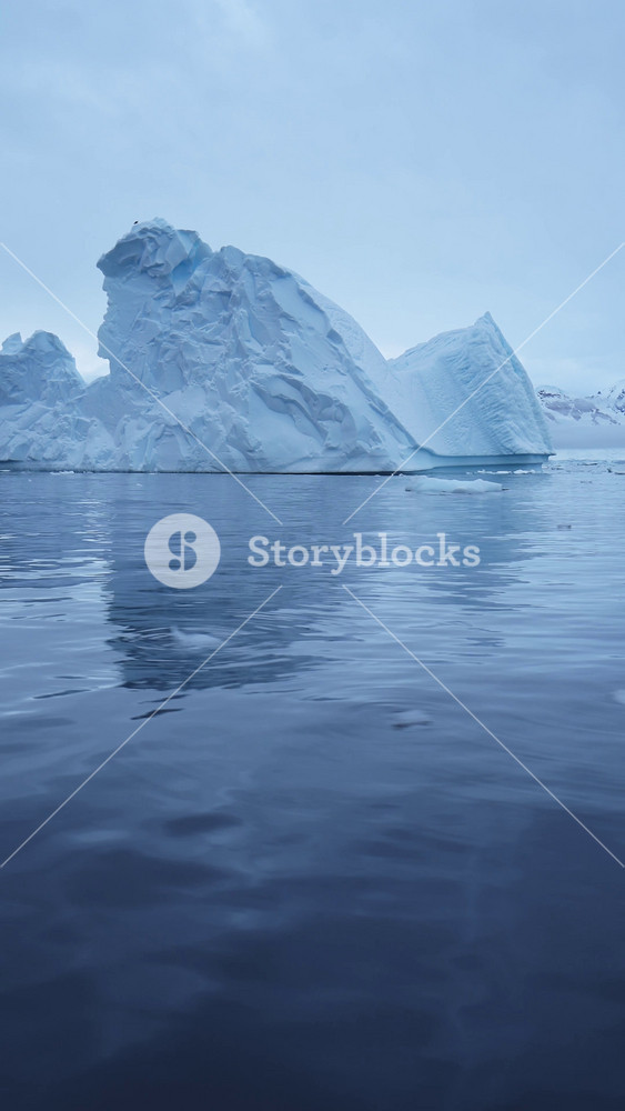 Iceberg Seascape of Ice and Sea in Antarctica, Vertical Antarctic Peninsula Winter Nature Video for Social Media, Instagram Reels and