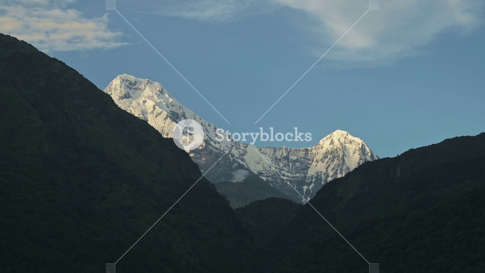 Massive High Altitude Snowy Mountain Peaks, Big Snowcapped Mountain Top in the Annapurna Region of Nepal while Trekking and Hiking on the