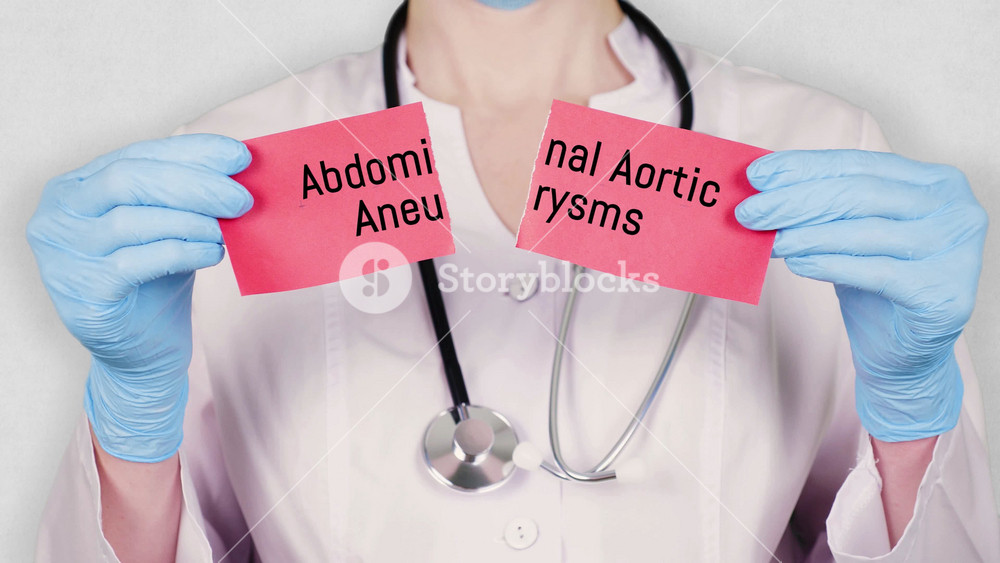 closeup, hands in blue medical gloves hold and tear red paper card with an inscription Abdominal Aortic Aneurysms. doctor dressed in white medical uniform, has a stethoscope.