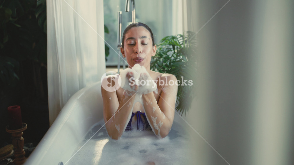 Stay calm and relaxed, beautiful multiethnic women taking bath with soap foam. Pretty young adult woman washing body, spa treatments for