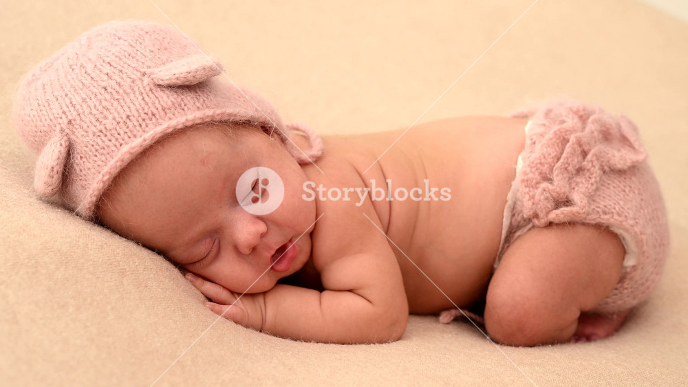 Sleeping newborn cute baby girl or boy during first week of life. 4k slow motion120 fps raw video. Happy family concept. Small baby sleep in