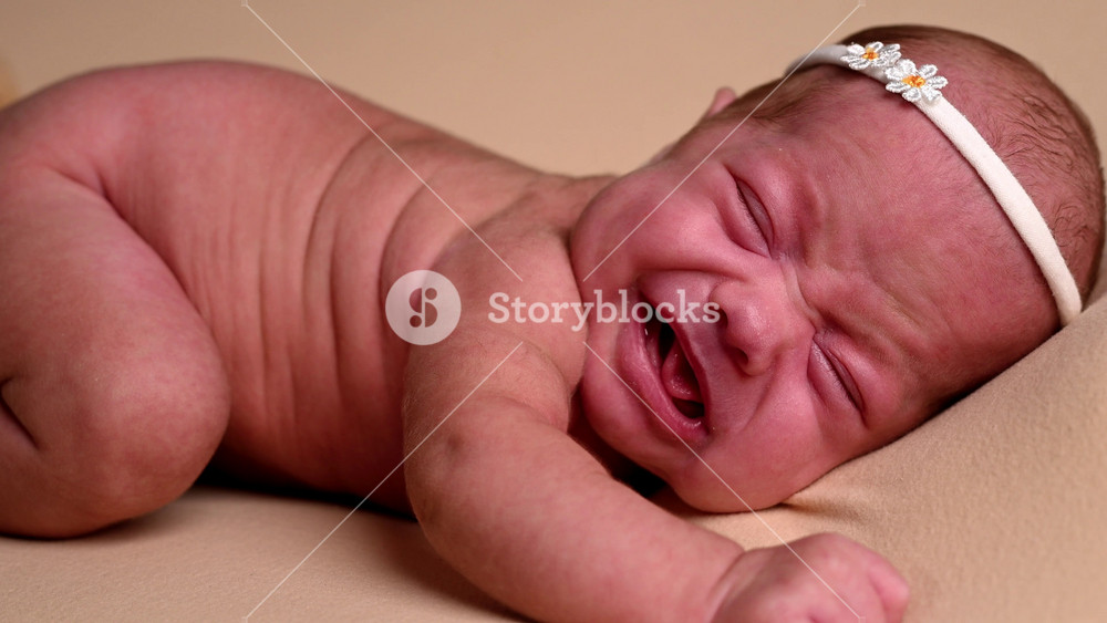 Sleeping newborn cute baby girl or boy cry during first week of life. 4k slow motion120 fps raw video. Happy family concept. Small baby