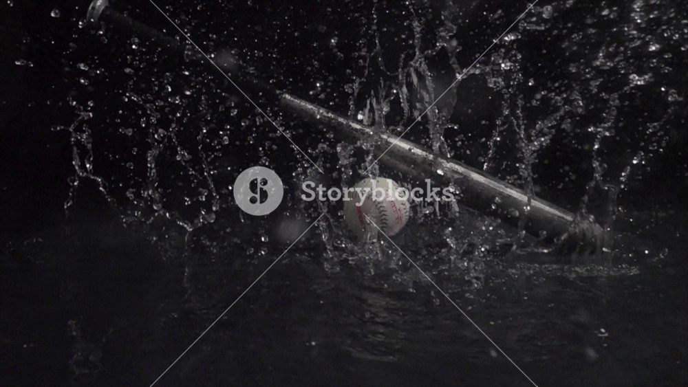Super Slow Motion Shot of baseball ball, bat, and glove at 1000 fps. Sport concept super slow motion shot on high speed camera 1000 fps.