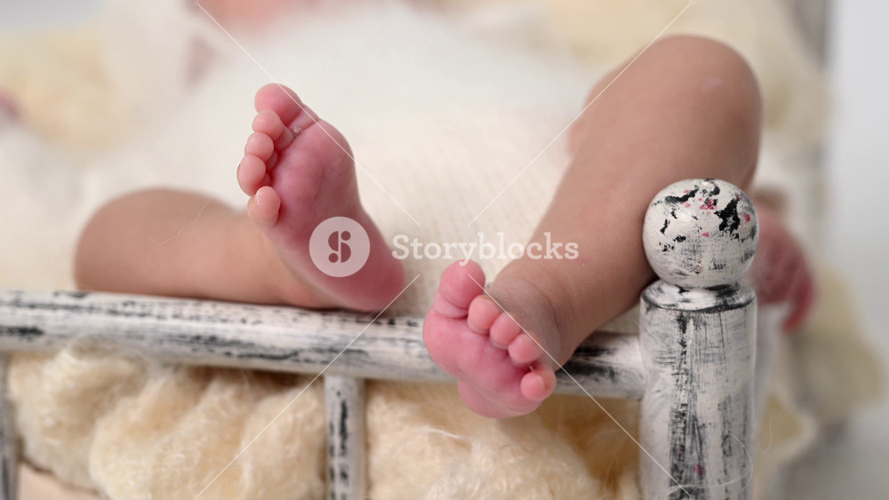 Sleeping newborn cute baby girl or boy during first week of life. 4k slow motion raw video. Breakfast concept. Small baby sleep in white