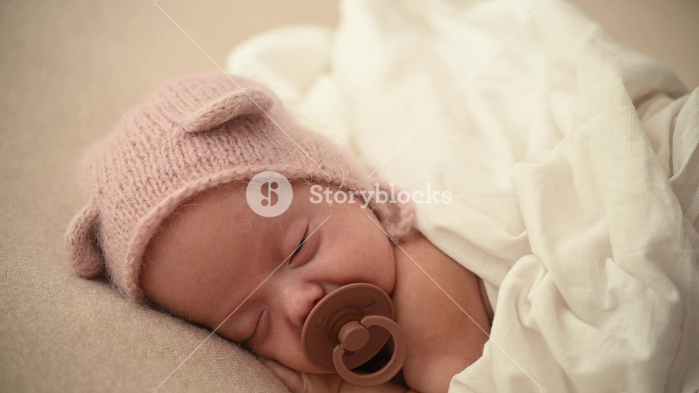 Sleeping newborn cute baby girl or boy during first week of life. 4k slow motion120 fps raw video. Happy family concept. Small baby sleep in