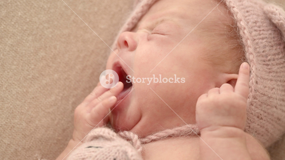 Sleeping newborn cute baby girl or boy during first week of life. 4k slow motion120 fps raw video. Happy family concept. Small baby sleep in