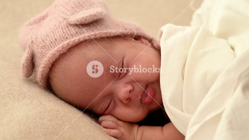 Sleeping newborn cute baby girl or boy during first week of life. 4k slow motion120 fps raw video. Happy family concept. Small baby sleep in