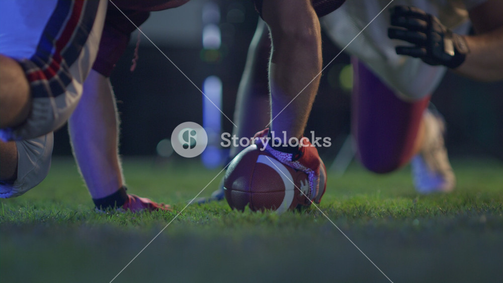 American Football Game Start Teams Ready: Close-up Portrait of Two Professional Players, Aggressive Face off. Full of Brutal Energy, Power