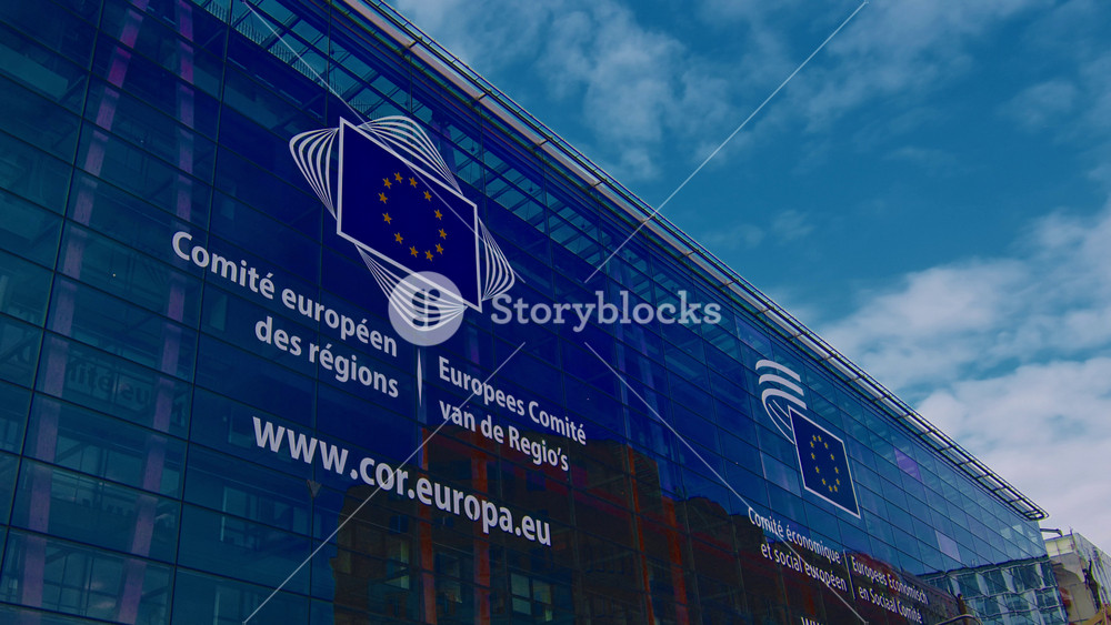 Brussels, Belgium, 26 May 2025: Time lapse of the European Parliament. The elected legislative body of the European Union. Modern glass building. Establishing shot Politics Power Landmark