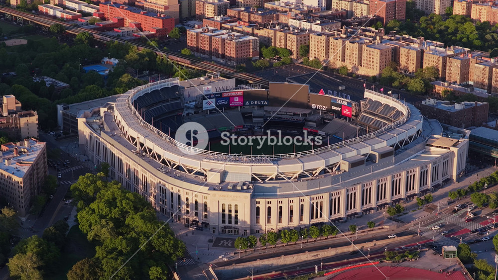 Yankee Stadium in South Bronx, New York City showing the iconic baseball field and surrounding district with residential buildings during