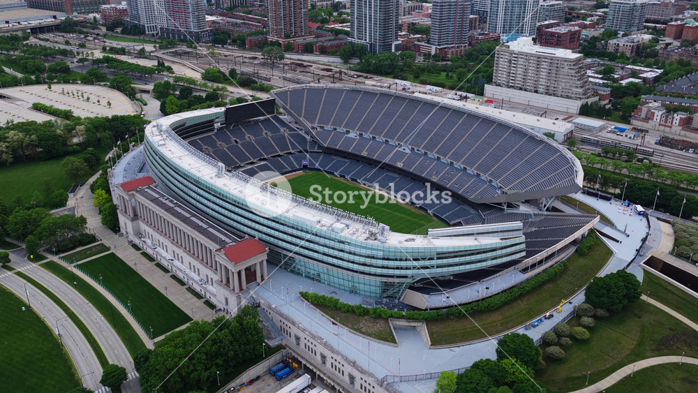 Soldier Field stadium in Chicago modern architecture and columns, of Chicago Bears football team, with cityscape and highway transportation