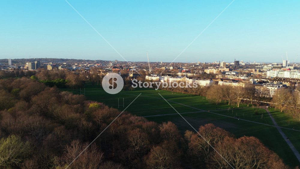 Scenic elevated panorama of Primrose Hill public park located north of Regent's Park in the London Borough of Camden, revealing verdant