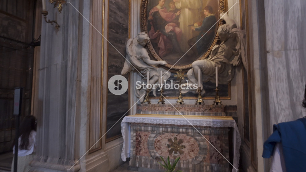 Rome Italy July 30th 2025 Religious Painting With Marble Angel Sculptures And Candlesticks On Side Altar Of Basilica Di Santa Maria Maggiore In Rome