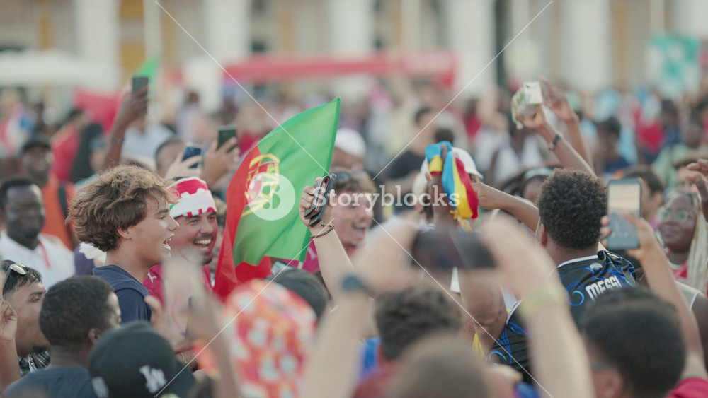 17 june 2026, lisbon, Portugal -Excitement builds as fans celebrate at the football mundial championship event in the stadium area