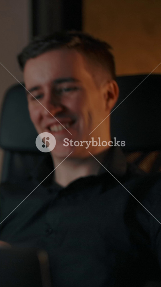 Vertical of Happy caucasian entrepreneur winning great deal at home behind laptop - Professional Stock Footage
